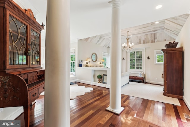 2740 Hunter Mill Rd, Oakton, VA 22124 - foyer entrance with ornate columns, lofted ceiling, wood finished floors, plenty of natural light, and recessed lighting