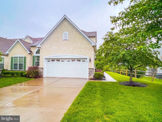 60 Mcconkey Dr, Washington Crossing, PA 18977 - view of front facade featuring stone siding, stucco siding, driveway, and a front yard
