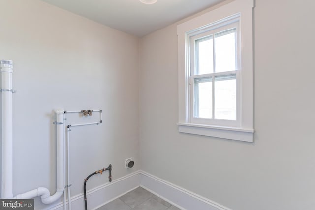 147 N Spruce St, Elizabethtown, PA 17022 - laundry room with washer hookup, plenty of natural light, light tile patterned floors, and baseboards