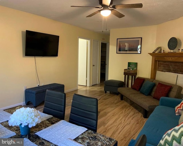 7108 Robinwood Dr, Tobyhanna, PA 18466 - living room featuring a ceiling fan, wood finished floors, and baseboards