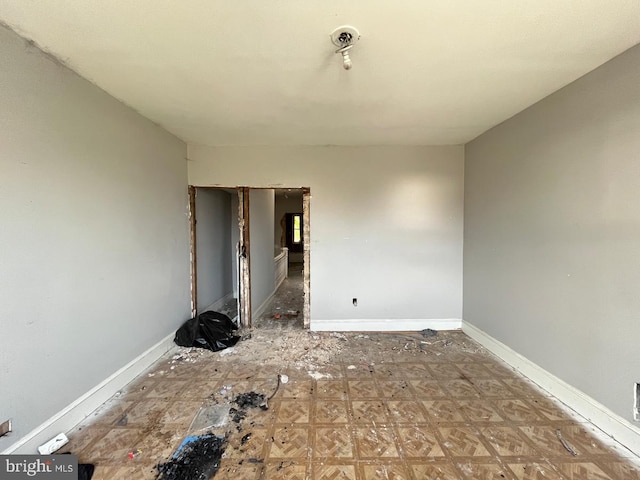 2554 Frederick Ave, Baltimore, MD 21223 - spare room featuring baseboards