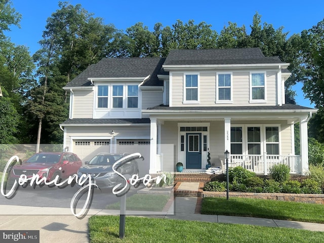 2346 Sweet Pepperbrush Loop, Dumfries, VA 22026 - view of front of house with a porch, a garage, and concrete driveway