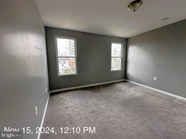 2468 Greenmount Ave, Baltimore, MD 21218 - carpeted empty room featuring baseboards