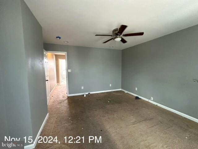 2468 Greenmount Ave, Baltimore, MD 21218 - spare room with ceiling fan and baseboards