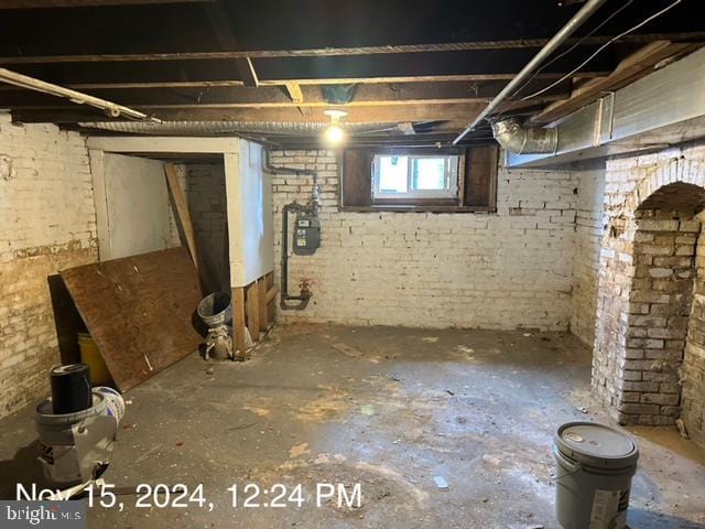2468 Greenmount Ave, Baltimore, MD 21218 - below grade area featuring gas meter and brick wall