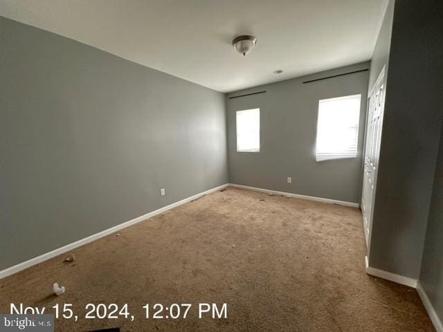 2468 Greenmount Ave, Baltimore, MD 21218 - spare room with carpet flooring and baseboards