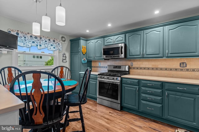 3778 Westhampton Dr, Philadelphia, PA 19154 - kitchen with appliances with stainless steel finishes, light countertops, decorative light fixtures, backsplash, and recessed lighting