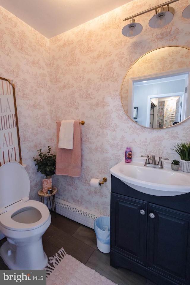 5143 Venice Ave, Hammonton, NJ 08037 - bathroom with baseboard heating, vanity, toilet, and wallpapered walls