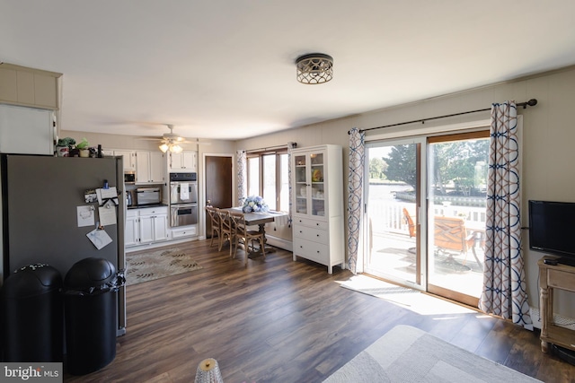 5143 Venice Ave, Hammonton, NJ 08037 - kitchen featuring stainless steel appliances, healthy amount of natural light, dark wood-style flooring, and white cabinets