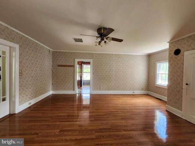 6428 Quantico Rd, Quantico, MD 21856 - empty room featuring wood finished floors, crown molding, ceiling fan, wallpapered walls, and baseboards