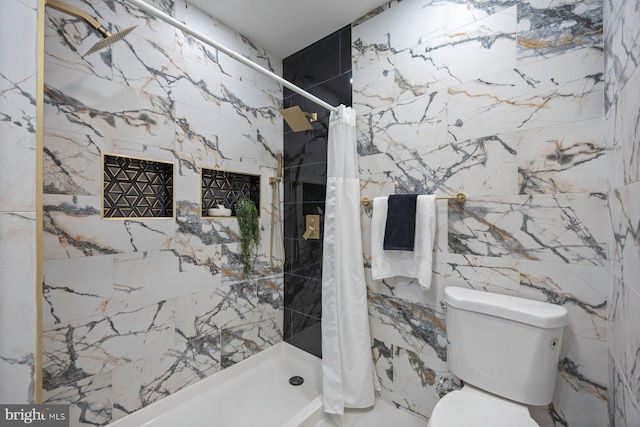 5300 Merceron Ave, Baltimore, MD 21207 - bathroom with a shower stall, toilet, and tile walls