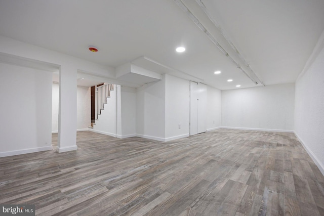 5300 Merceron Ave, Baltimore, MD 21207 - finished below grade area with stairs, wood finished floors, baseboards, and recessed lighting