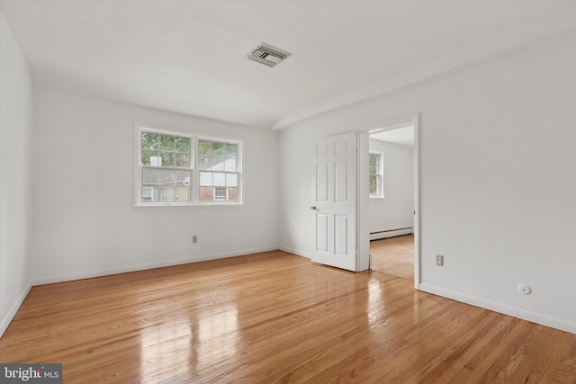 425 Wister Rd, Wynnewood, PA 19096 - unfurnished room featuring baseboard heating, light wood-type flooring, and baseboards