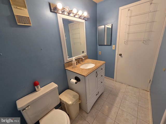 2704 Adams Ct, North Wales, PA 19454 - bathroom featuring toilet, vanity, tile patterned floors, and baseboards
