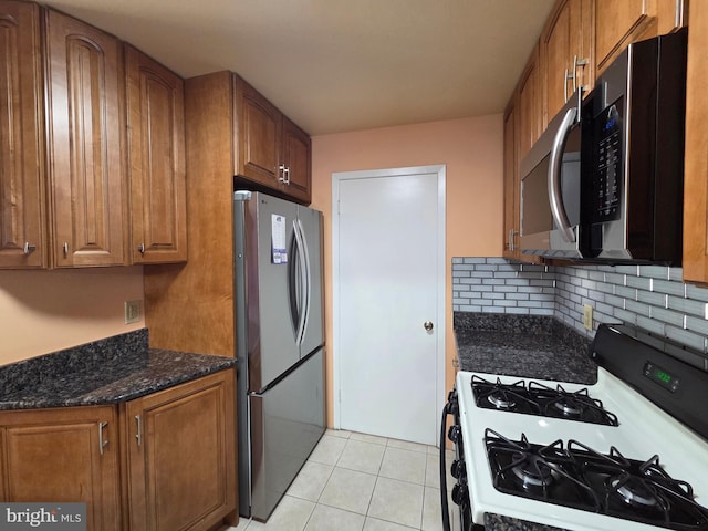 2704 Adams Ct, North Wales, PA 19454 - kitchen featuring stainless steel appliances, backsplash, and brown cabinetry