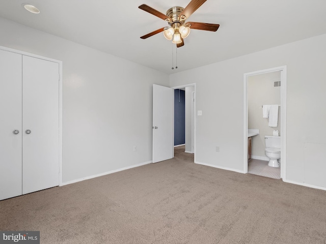 1806 Bryant St NE Unit 1806, Washington, DC 20018 - unfurnished bedroom featuring carpet flooring, baseboards, connected bathroom, a closet, and ceiling fan