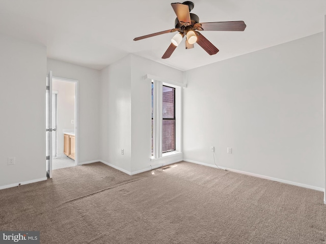 1806 Bryant St NE Unit 1806, Washington, DC 20018 - spare room with light colored carpet, ceiling fan, and baseboards