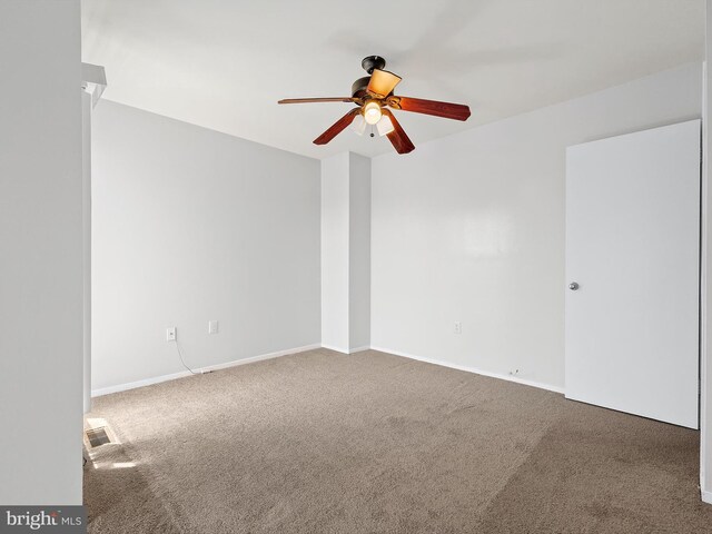 1806 Bryant St NE Unit 1806, Washington, DC 20018 - empty room featuring a ceiling fan, carpet, and baseboards