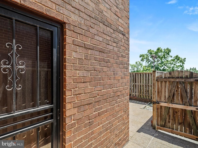 1806 Bryant St NE Unit 1806, Washington, DC 20018 - doorway to property featuring brick siding and a gate