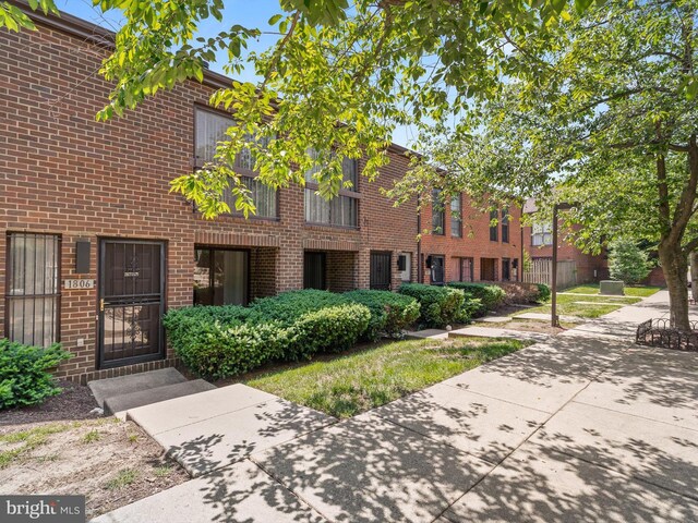1806 Bryant St NE Unit 1806, Washington, DC 20018 - view of front facade with brick siding