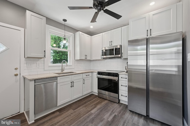 527 Brookside Ave, Lansdowne, PA 19050 - kitchen with stainless steel appliances, a sink, ceiling fan, white cabinetry, and recessed lighting