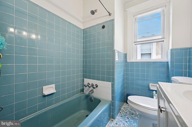 527 Brookside Ave, Lansdowne, PA 19050 - full bathroom featuring toilet, tile patterned floors, vanity, tile walls, and shower / bathtub combination