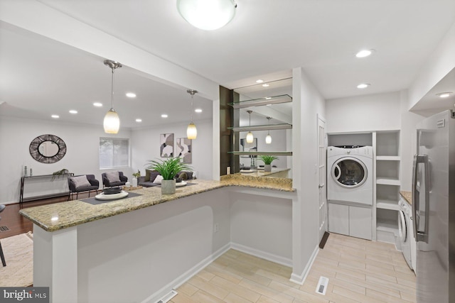 29 Stonehenge Cir Unit 6, Pikesville, MD 21208 - laundry room featuring washer / clothes dryer, recessed lighting, and baseboards