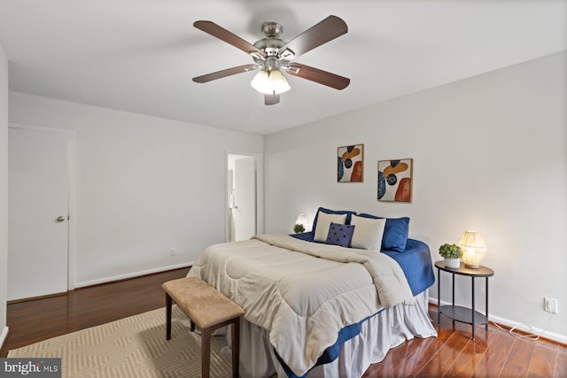 29 Stonehenge Cir Unit 6, Pikesville, MD 21208 - bedroom with baseboards, wood finished floors, and ceiling fan