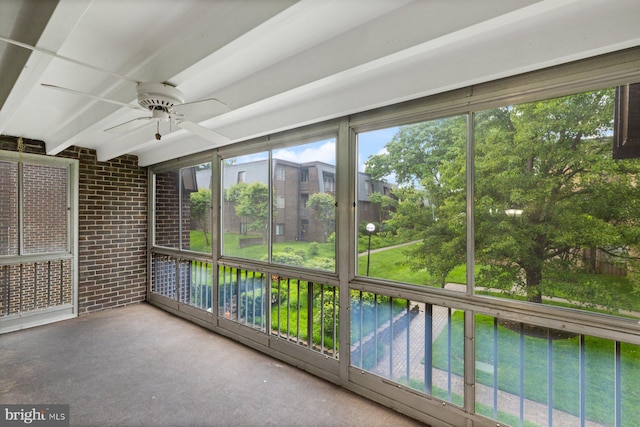 29 Stonehenge Cir Unit 6, Pikesville, MD 21208 - unfurnished sunroom with a ceiling fan and beamed ceiling