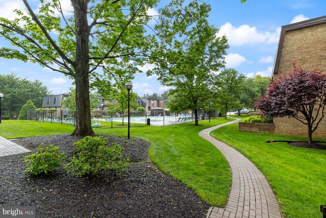 29 Stonehenge Cir Unit 6, Pikesville, MD 21208 - view of community with a pool