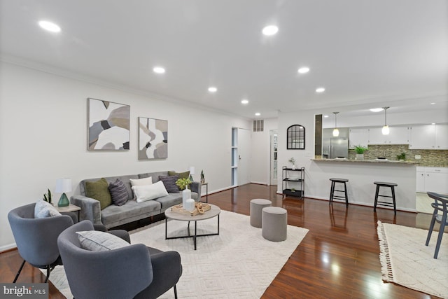 29 Stonehenge Cir Unit 6, Pikesville, MD 21208 - living area with crown molding, recessed lighting, dark wood finished floors, and baseboards