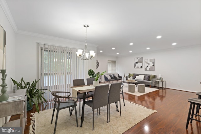 29 Stonehenge Cir Unit 6, Pikesville, MD 21208 - dining room featuring crown molding, wood finished floors, a chandelier, recessed lighting, and baseboards