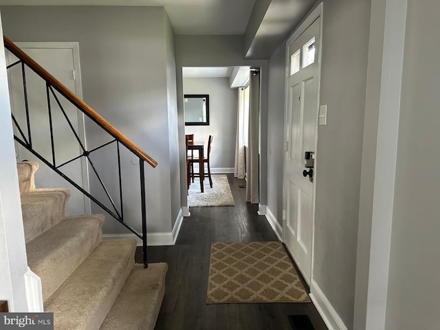 15709 Presswick Ln, Bowie, MD 20716 - entrance foyer with wood finished floors, baseboards, and stairway
