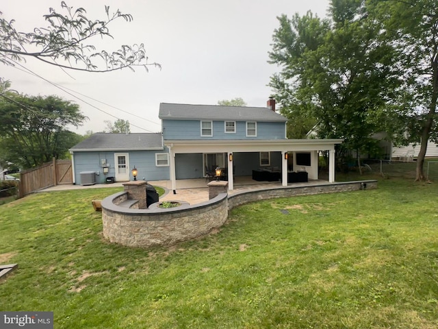 15709 Presswick Ln, Bowie, MD 20716 - back of house with a patio area, central air condition unit, an outdoor living space with a fire pit, and a chimney