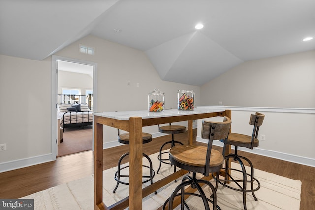 25493 Grassy Meadow Dr, Aldie, VA 20105 - dining area featuring lofted ceiling, wood finished floors, baseboards, and recessed lighting