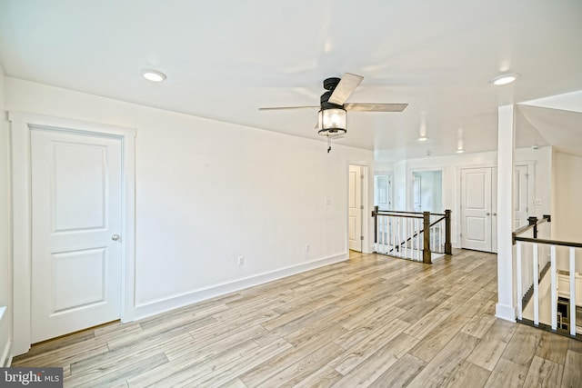 35024 Black Walnut Dr, Lewes, DE 19958 - empty room featuring light wood-style flooring, recessed lighting, ceiling fan, and baseboards