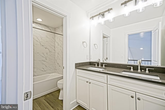 35024 Black Walnut Dr, Lewes, DE 19958 - full bathroom featuring double vanity, toilet, bathtub / shower combination, and wood finished floors