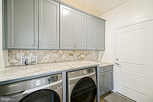 35024 Black Walnut Dr, Lewes, DE 19958 - laundry area with cabinet space and separate washer and dryer
