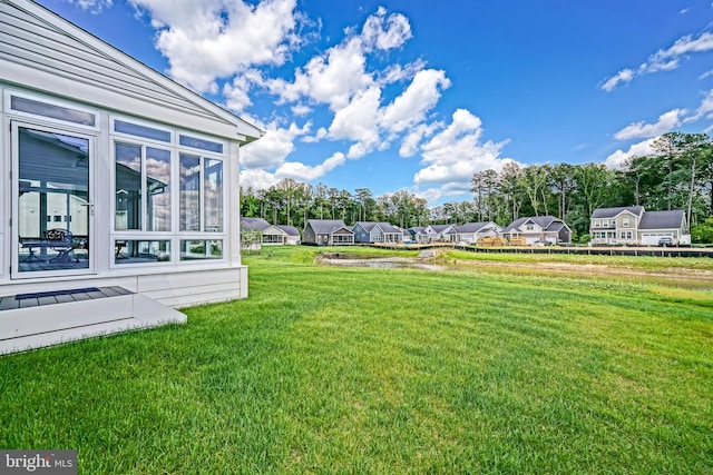 35024 Black Walnut Dr, Lewes, DE 19958 - view of green lawn featuring a residential view and a sunroom