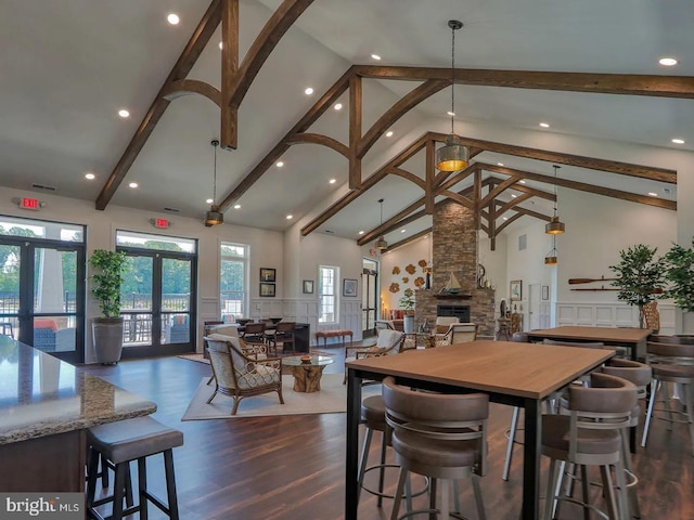 35024 Black Walnut Dr, Lewes, DE 19958 - dining room featuring high vaulted ceiling, beam ceiling, dark wood finished floors, and french doors