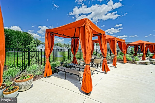35024 Black Walnut Dr, Lewes, DE 19958 - view of patio featuring a gazebo and outdoor dining space