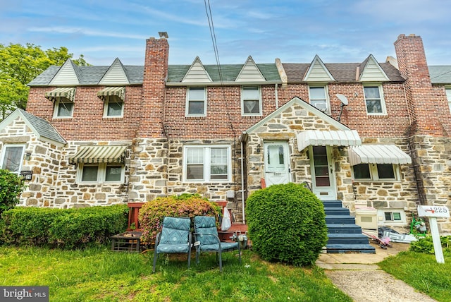 1227 Eddystone Ave, Crum Lynne, PA 19022 - multi unit property with stone siding, a chimney, and a high end roof