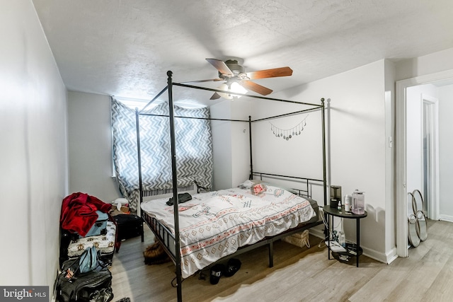 1227 Eddystone Ave, Crum Lynne, PA 19022 - bedroom featuring light wood finished floors, ceiling fan, and baseboards