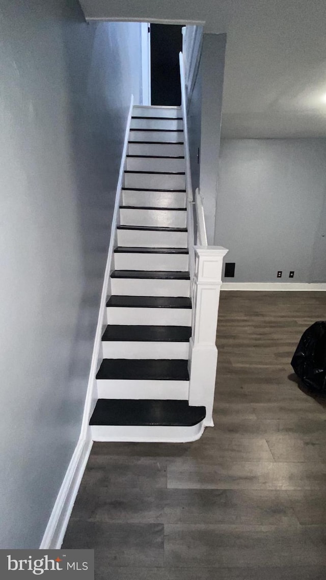 2751 N Hemberger St, Philadelphia, PA 19132 - stairs with baseboards and wood finished floors