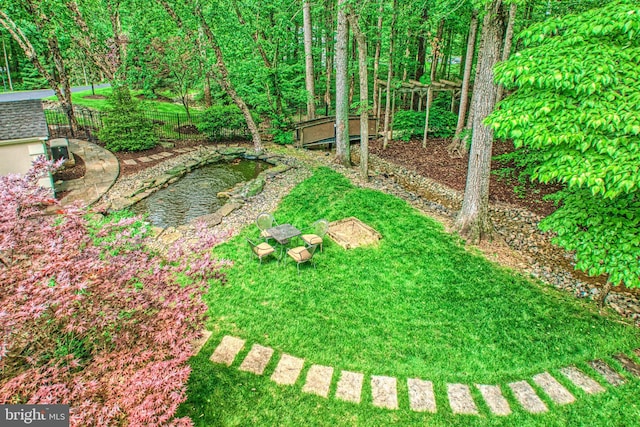 5026 Huntwood Manor Dr, Fairfax, VA 22030 - view of yard featuring a garden pond