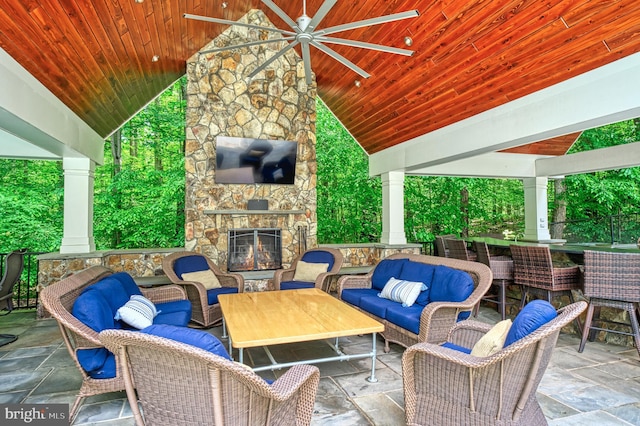 5026 Huntwood Manor Dr, Fairfax, VA 22030 - view of patio featuring a ceiling fan, an outdoor living space with a fireplace, and an outdoor bar