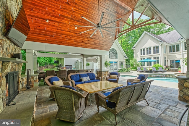 5026 Huntwood Manor Dr, Fairfax, VA 22030 - view of patio / terrace featuring an outdoor bar, an outdoor living space, ceiling fan, and an outdoor pool