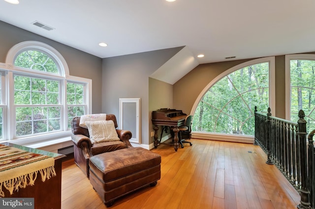 5026 Huntwood Manor Dr, Fairfax, VA 22030 - living area with plenty of natural light, an upstairs landing, a baseboard heating unit, recessed lighting, and light wood finished floors