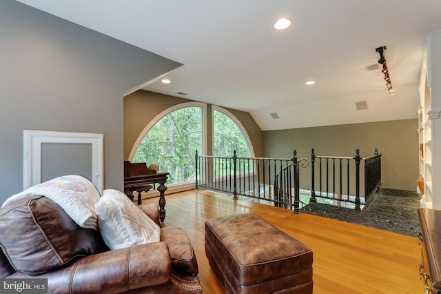 5026 Huntwood Manor Dr, Fairfax, VA 22030 - living area with wood finished floors, lofted ceiling, recessed lighting, and rail lighting