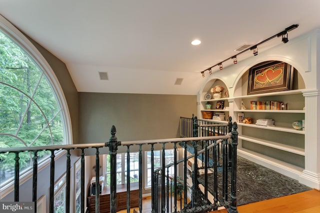 5026 Huntwood Manor Dr, Fairfax, VA 22030 - hallway with lofted ceiling, an upstairs landing, track lighting, and wood finished floors